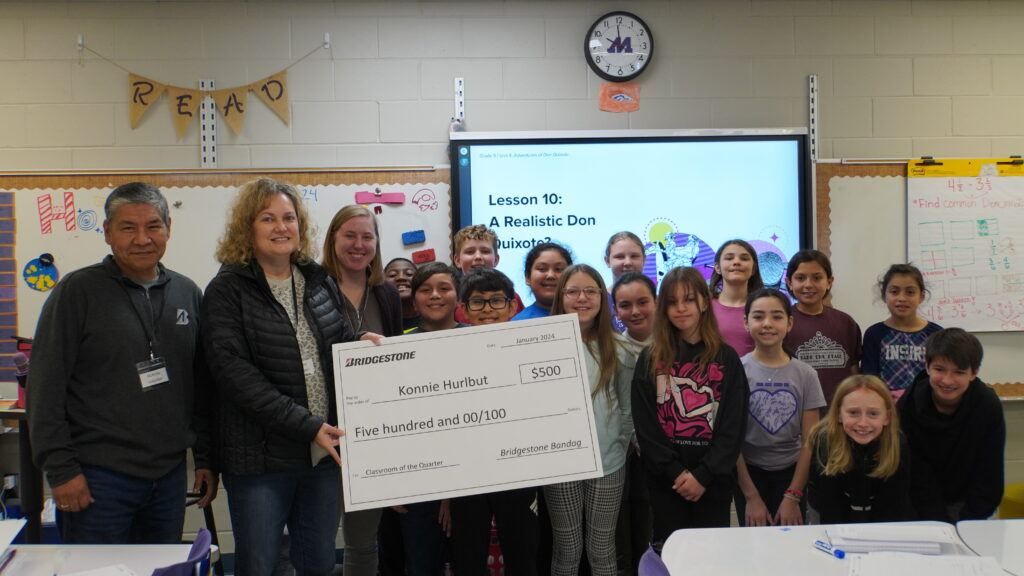 Picture of McKinley teacher Konnie Hurlbut presented with $500 from Bridgestone Bandag to use in her classroom. This is the Bridgestone Classroom of the Quarter presentation done each quarter for teachers in our school district. 